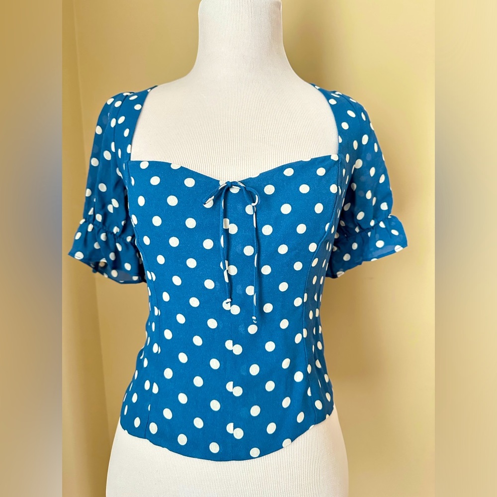 NWT Reformation Delevan top in Lazuli blue. Size 2 and in perfect condition.